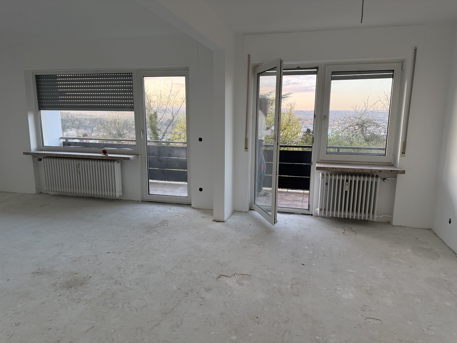 Wohnraum mit Balkonbezug Vorher-nachher-Vergleich Nachher